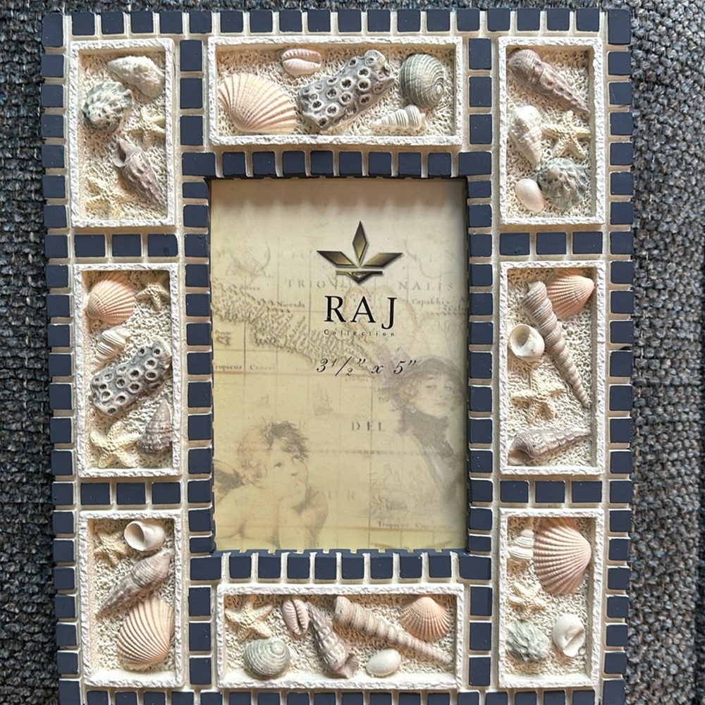 Beach Photo Frame by RAJ. Has seashells on cover of the frame. NWOT